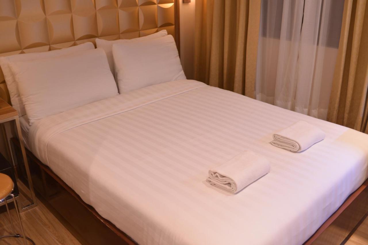 Robertson Hotel Naga Szoba fotó